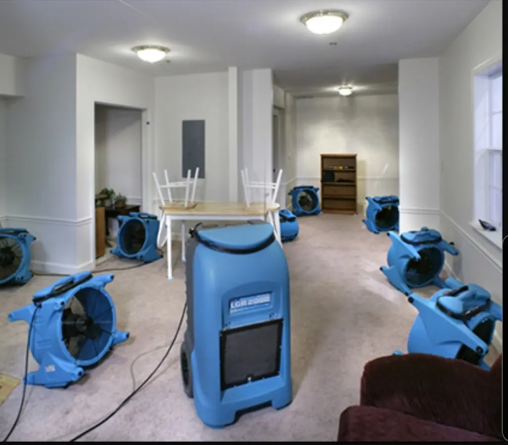 Air movers and dehumidifier setup for Water Damage Restoration in Waunakee